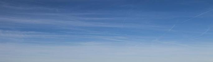 Image of a partly cloudy and partly clear sky during the day photo