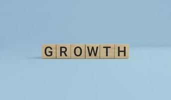 GROWTH word made with wooden cube blocks. photo