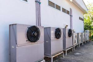 Air Conditioner Compressor Unit installed outdoor photo