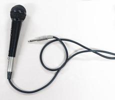 Close up microphone on white background photo