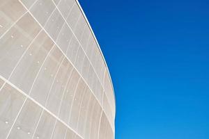 Detail of modern architecture building against blue sky photo