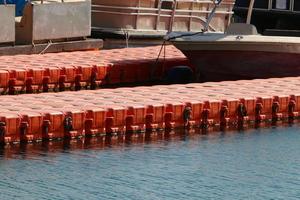 Berth on the seashore for mooring boats and yachts. photo