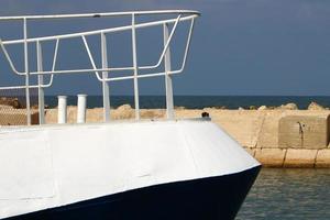 Berth on the seashore for mooring boats and yachts. photo