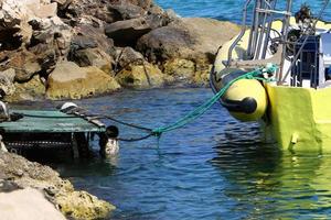 Berth on the seashore for mooring boats and yachts. photo
