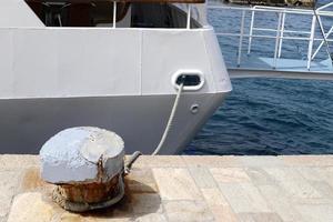 Berth on the seashore for mooring boats and yachts. photo