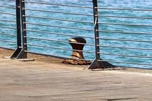 Berth on the seashore for mooring boats and yachts. photo