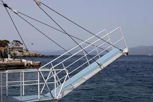 Berth on the seashore for mooring boats and yachts. photo