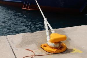 Berth on the seashore for mooring boats and yachts. photo