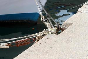 Berth on the seashore for mooring boats and yachts. photo