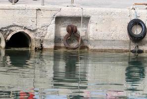 Berth on the seashore for mooring boats and yachts. photo