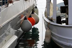 Berth on the seashore for mooring boats and yachts. photo