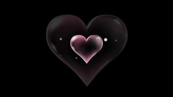 animering röd hjärta form flytande på svart bakgrund. video