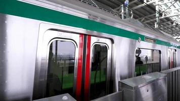 10 January 2023, Dhaka-Bangladesh. The Dhaka Metro Mass Rapid Transit MRT High-Speed electric train on the platform video