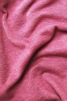 burgundy viva magenta wrinkled plush fabric background texture, soft material pattern photo