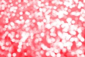 pink sparkles on a purple background. Festive backdrop for your projects. photo