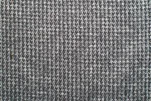 textura textil negra. primer plano de fondo de algodón suave. foto