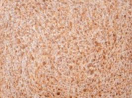 Abstract close-up of a piece of bread background texture photo