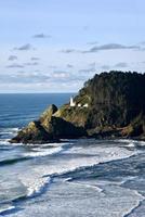 waves breaking on the rugged Oregon coast photo