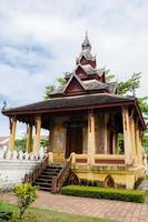 Antique Pavilion of Wat Sisaket Monastery at Vientiane City of Laos photo