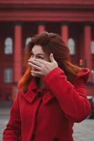 Close up happy lady wiping face on street portrait picture photo