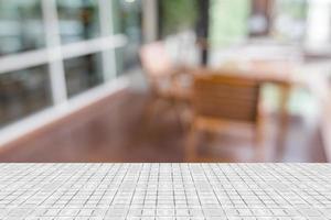 Top desk with blur restaurant background,wooden table photo