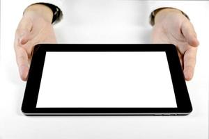 Businessman holding a tablet on white background photo