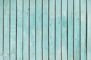 blue old wooden fence. wood palisade texture. planks background photo