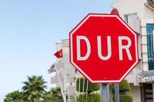 Red stop or DUR sign in Turkish photo