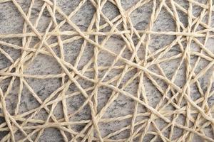 Weave pattern, gray background, vintage frame. Copy space. photo