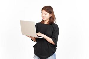 Happy face while using laptop Of Beautiful Asian Woman Isolated On White Background photo