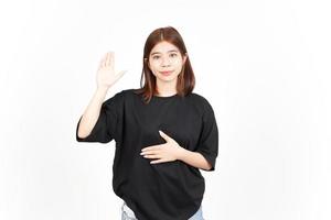 Swearing Gesture, Make an Oath of Beautiful Asian Woman Isolated On White Background photo