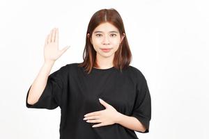 Swearing Gesture, Make an Oath of Beautiful Asian Woman Isolated On White Background photo