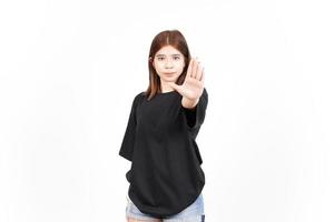 STOP Rejection Hand Gesture Of Beautiful Asian Woman Isolated On White Background photo