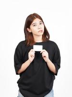 Holding and Showing Blank Credit Card Of Beautiful Asian Woman Isolated On White Background photo