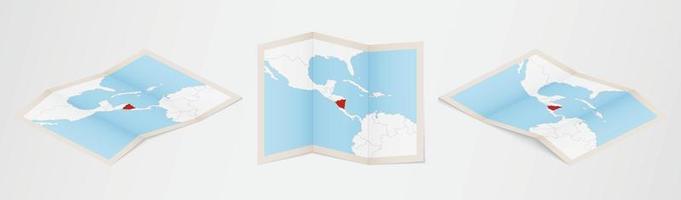 Folded map of Nicaragua in three different versions. vector