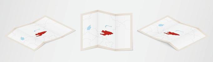 Folded map of Kyrgyzstan in three different versions. vector