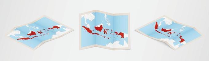 Folded map of Indonesia in three different versions. vector