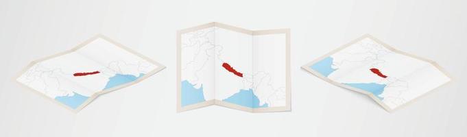 Folded map of Nepal in three different versions. vector