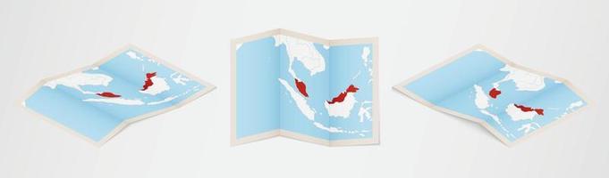 Folded map of Malaysia in three different versions. vector