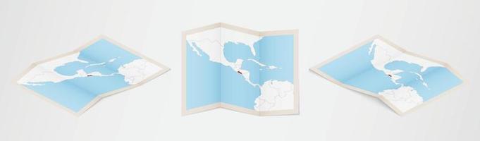 Folded map of El Salvador in three different versions. vector