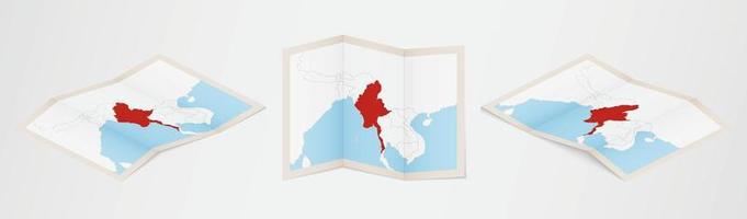 Folded map of Myanmar in three different versions. vector