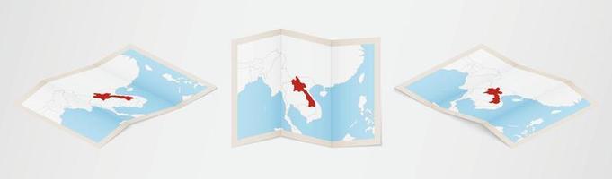 Folded map of Laos in three different versions. vector