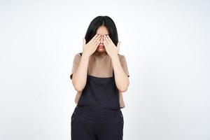 Covering Eye of Beautiful Asian Woman Isolated On White Background photo