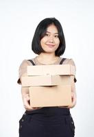 Holding Package Box or Cardboard Box of Beautiful Asian Woman Isolated On White Background photo