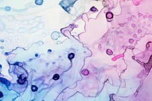 Blue pink and purple ink drops and splotches background photo