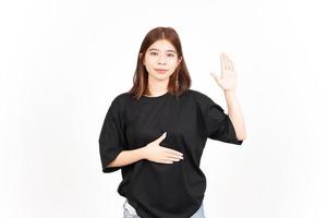 Swearing Gesture, Make an Oath of Beautiful Asian Woman Isolated On White Background photo