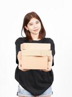 Holding Package Box or Cardboard Box Of Beautiful Asian Woman Isolated On White Background photo