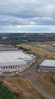 Aerial View of British Roads and Traffic Passing Through City. Drone's Camera Footage in Vertical and Portrait Style video