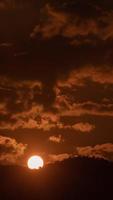 Timelapse of dramatic sunrise with orange sky in a sunny day. video