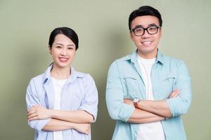 Photo of Asian couple on background